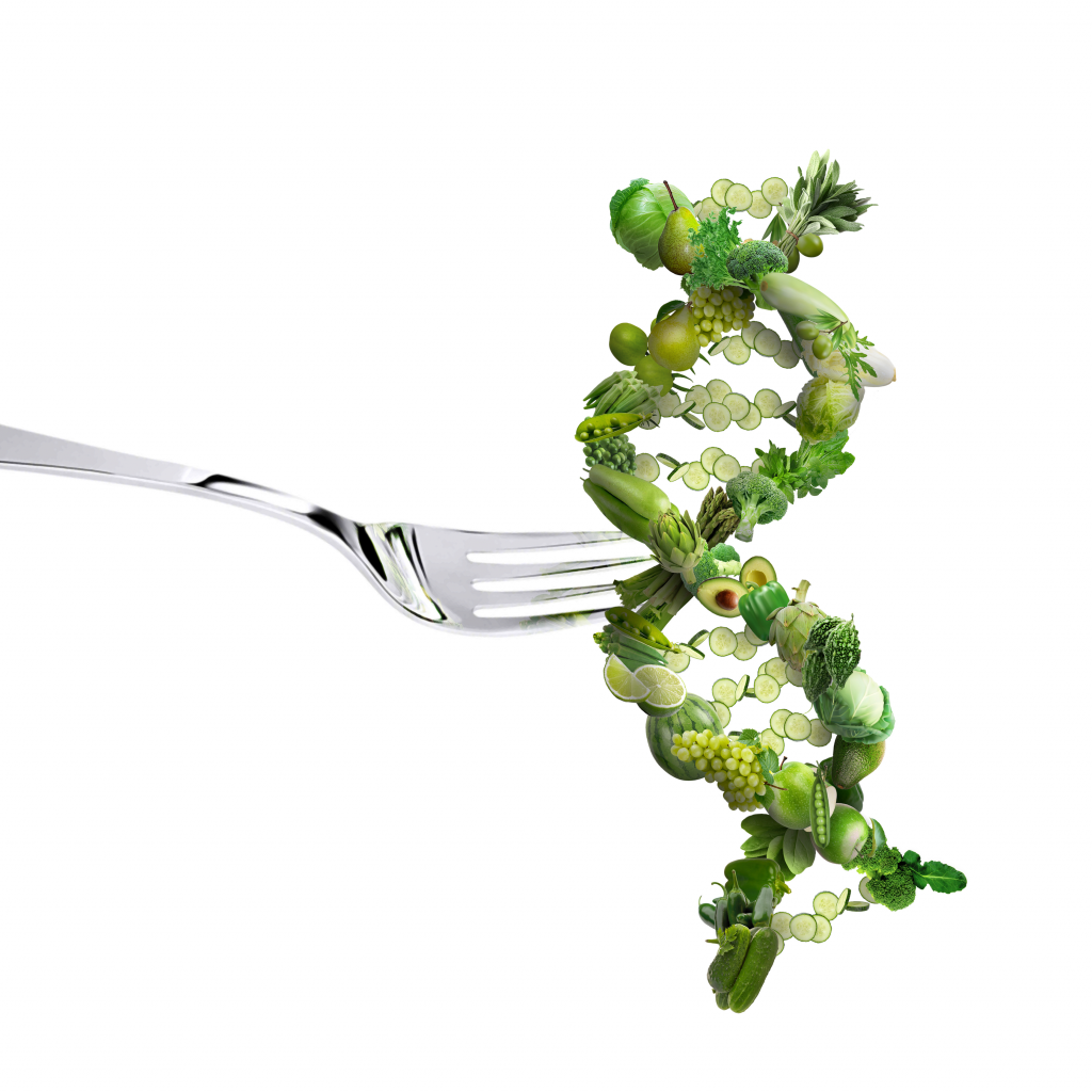 fourchette plantée dans une molécule d'ADN représenté avec des fruits et légumes verts.